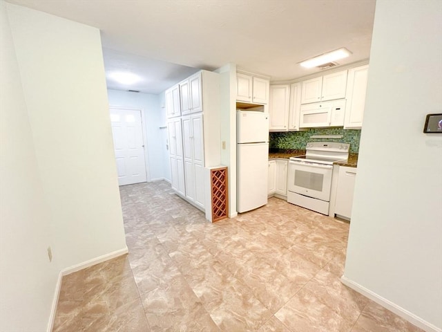 23 Hobart Ln Unit 23, Rockland, MA 02370 - kitchen with white appliances, dark countertops, baseboards, decorative backsplash, and white cabinetry