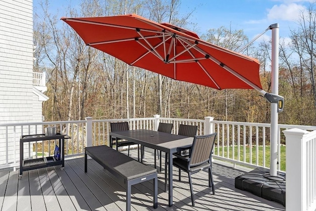 deck with outdoor dining space