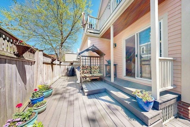 wooden terrace with fence