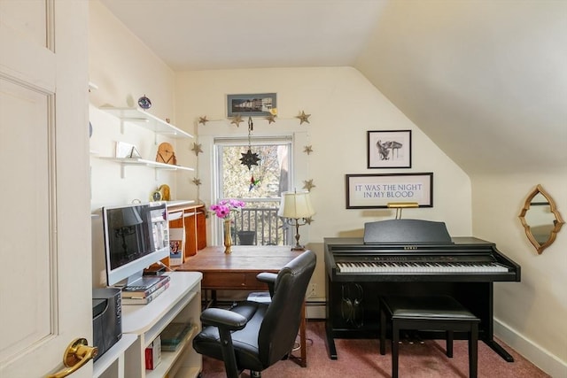 carpeted home office with lofted ceiling and baseboards