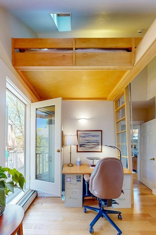 office space with light wood finished floors