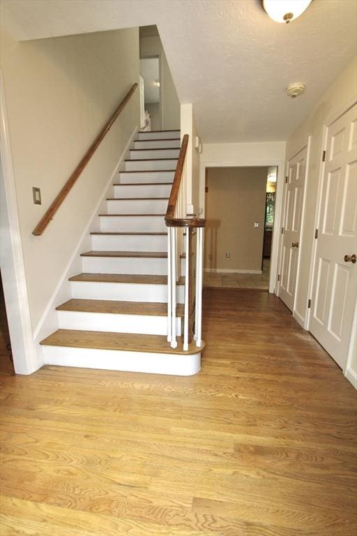 14 Oak Cir, Princeton, MA 01541 - staircase with wood finished floors and baseboards