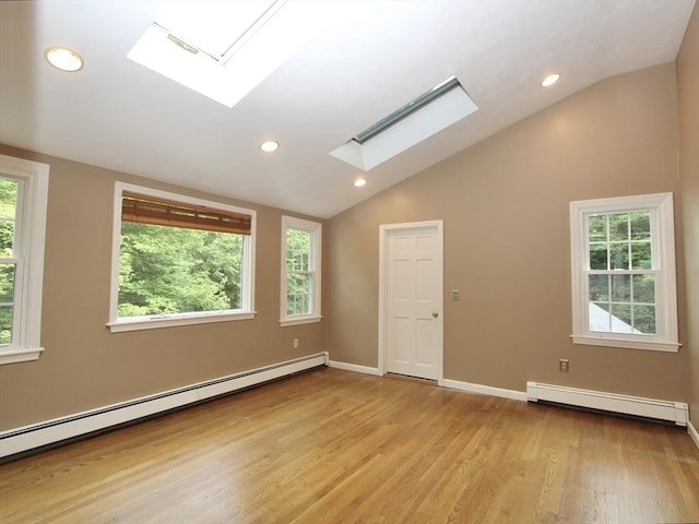 14 Oak Cir, Princeton, MA 01541 - spare room with a baseboard radiator, a skylight, vaulted ceiling, healthy amount of natural light, and recessed lighting