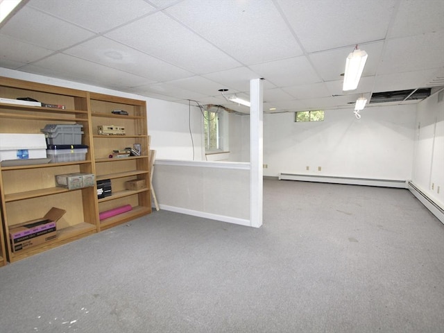14 Oak Cir, Princeton, MA 01541 - below grade area with a paneled ceiling, carpet floors, and a baseboard heating unit