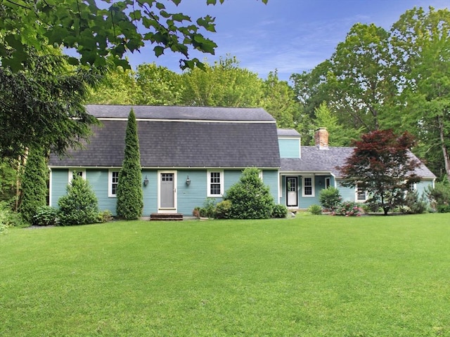 14 Oak Cir, Princeton, MA 01541 - colonial inspired home featuring a shingled roof, a front yard, and a chimney