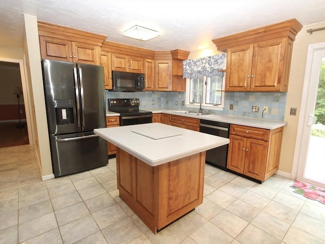 14 Oak Cir, Princeton, MA 01541 - kitchen with black appliances, brown cabinets, and light countertops
