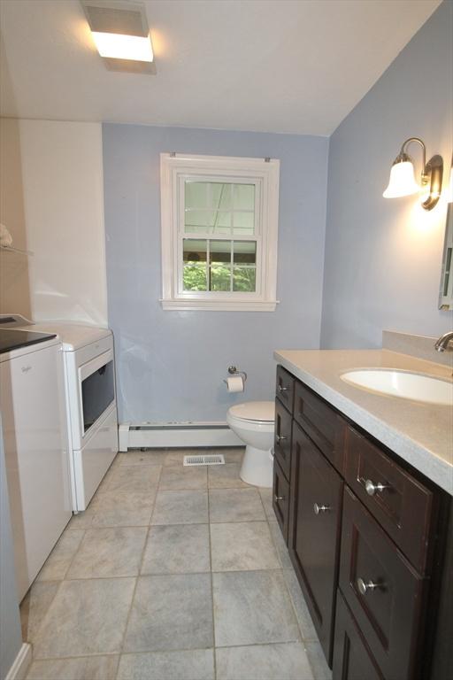 14 Oak Cir, Princeton, MA 01541 - full bath with washing machine and clothes dryer, vanity, and baseboard heating