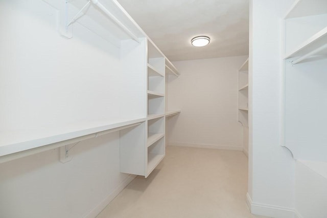 3 Longview Ter, Gloucester, MA 01930 - walk in closet featuring light colored carpet