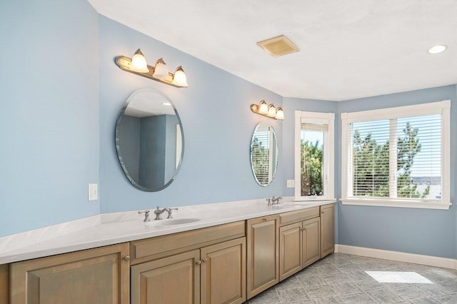3 Longview Ter, Gloucester, MA 01930 - full bathroom featuring baseboards, double vanity, and recessed lighting