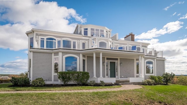 3 Longview Ter, Gloucester, MA 01930 - view of front of property featuring a balcony, a chimney, a front lawn, and a porch