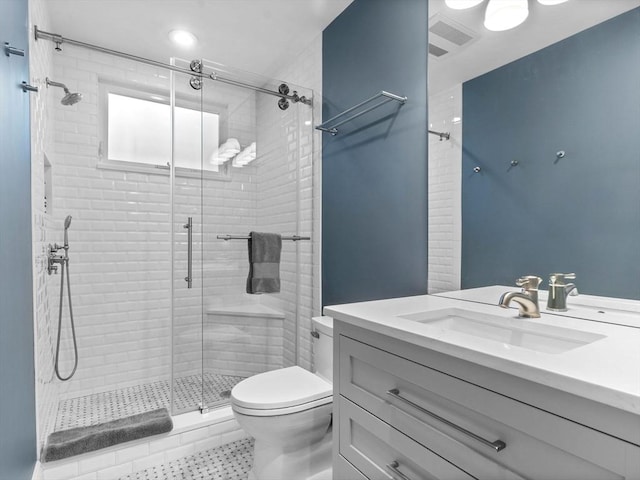 9 Sedgwick St Unit 1, Boston, MA 02130 - bathroom featuring vanity, a stall shower, tile patterned floors, and recessed lighting