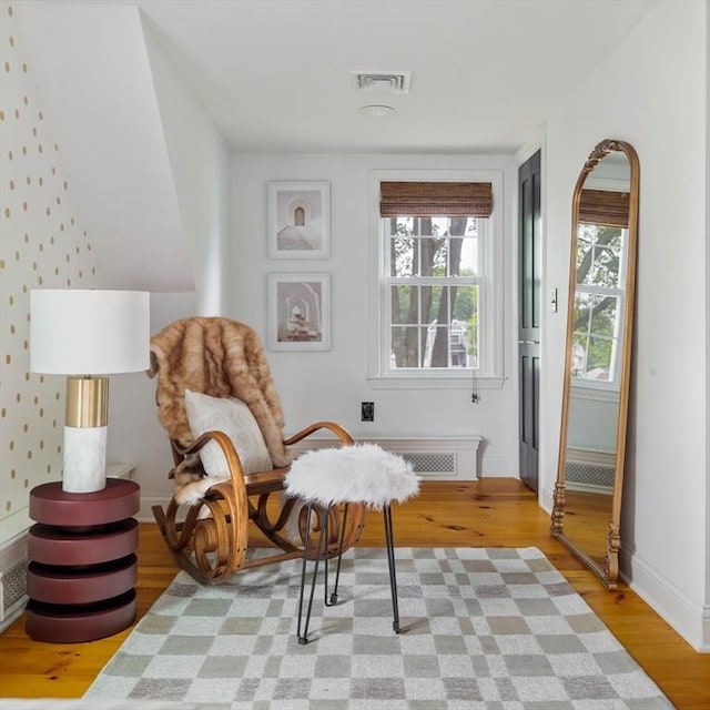 16 Hart Pl, Woburn, MA 01801 - living area featuring light wood-type flooring and baseboards