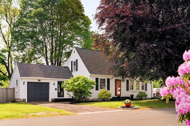 16 Hart Pl, Woburn, MA 01801 - view of front of house with a garage, driveway, and a shingled roof