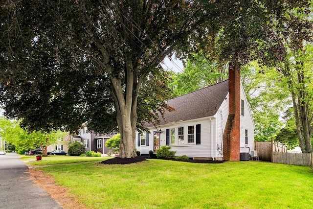 16 Hart Pl, Woburn, MA 01801 - view of front of house with a chimney and a shingled roof
