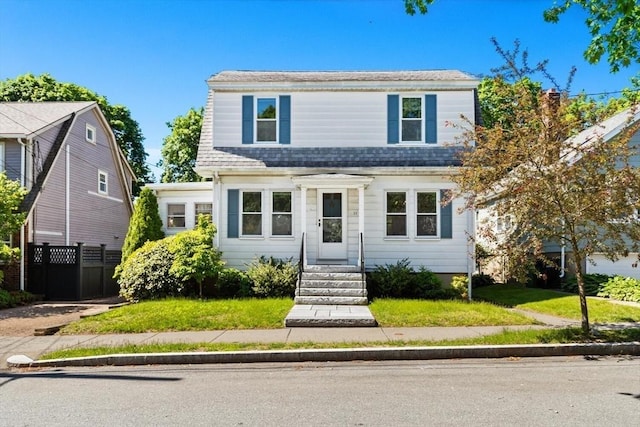33 Lowell Ave, Watertown, MA 02472 - view of front of property featuring entry steps and roof with shingles