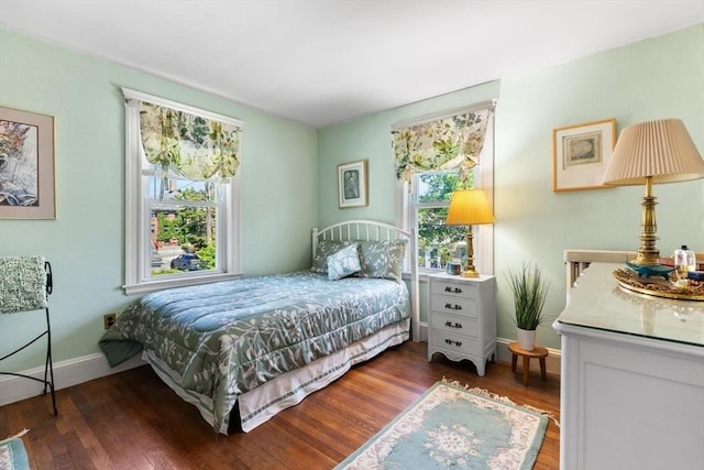 33 Lowell Ave, Watertown, MA 02472 - bedroom with baseboards and wood finished floors
