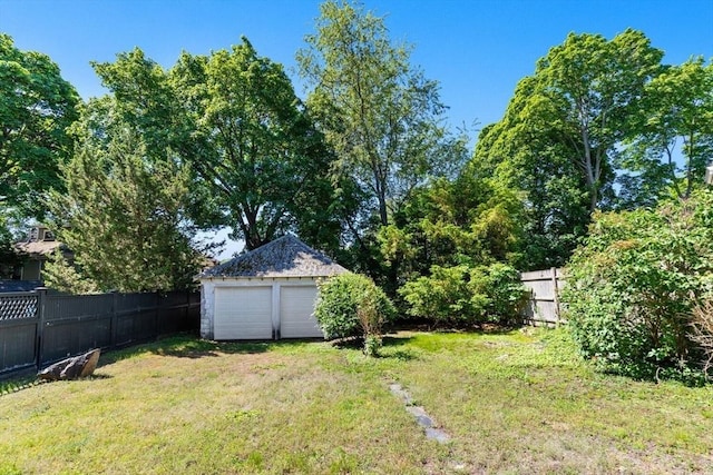 33 Lowell Ave, Watertown, MA 02472 - view of yard featuring a garage and an outdoor structure