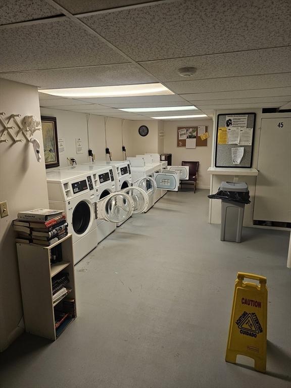 shared laundry with washing machine and clothes dryer