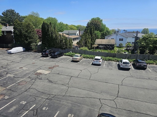 exterior view of a parking lot and fence