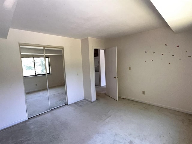 3 Bridgeview Cir Unit 55, Tyngsborough, MA 01879 - unfurnished bedroom featuring a closet and baseboards