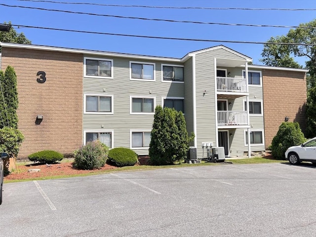 3 Bridgeview Cir Unit 55, Tyngsborough, MA 01879 - view of property featuring uncovered parking