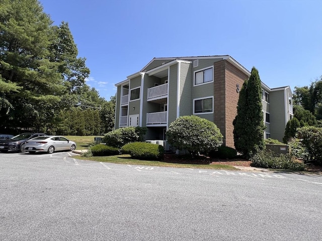 3 Bridgeview Cir Unit 55, Tyngsborough, MA 01879 - view of building exterior with uncovered parking