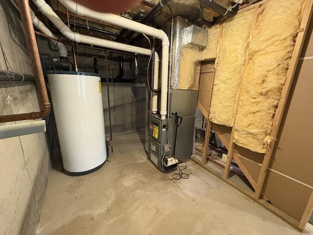 utility room with water heater and heating unit
