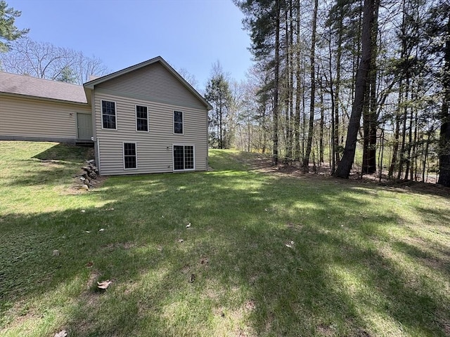 exterior space featuring a lawn
