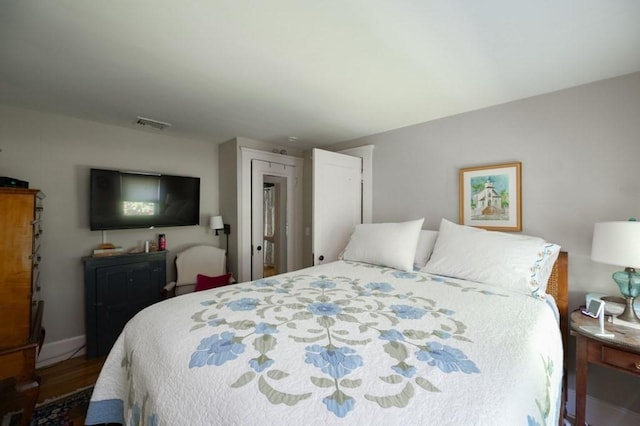 bedroom featuring hardwood / wood-style floors