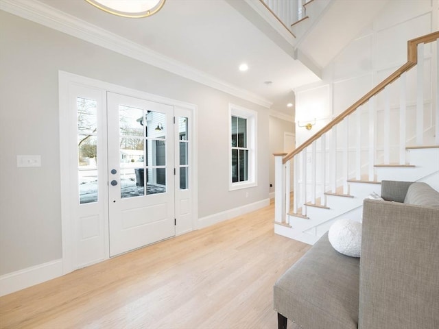 7 Brookdale Rd, Natick, MA 01760 - foyer with light wood-style floors, ornamental molding, stairs, and baseboards