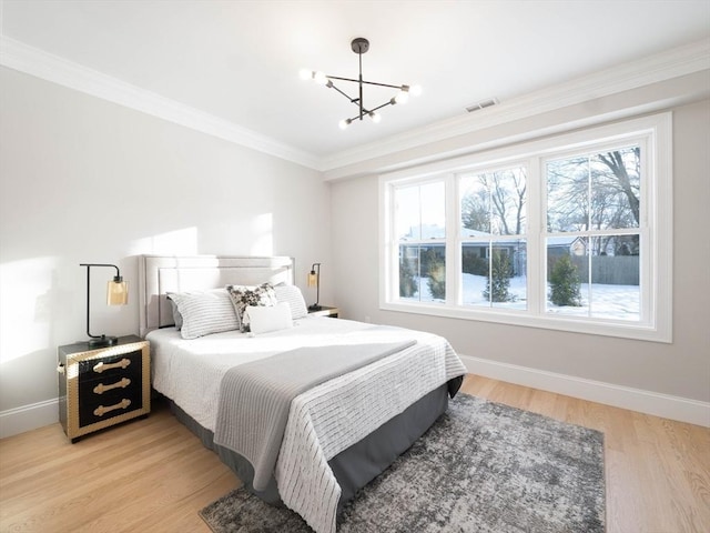7 Brookdale Rd, Natick, MA 01760 - bedroom featuring visible vents, ornamental molding, baseboards, a chandelier, and light wood finished floors