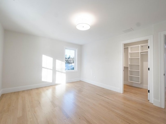 7 Brookdale Rd, Natick, MA 01760 - empty room with baseboards, visible vents, and light wood-style floors