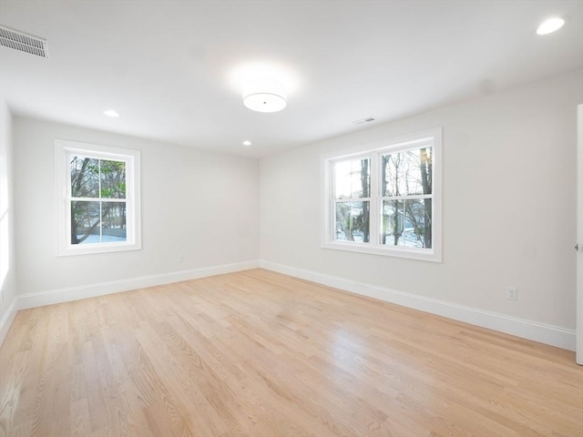 7 Brookdale Rd, Natick, MA 01760 - empty room featuring baseboards, visible vents, and light wood-style flooring