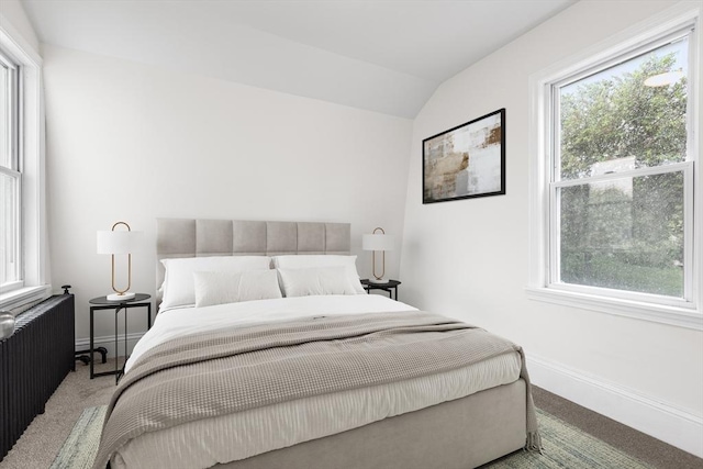 136 Locust Way, Winthrop, MA 02152 - carpeted bedroom with radiator heating unit, baseboards, and vaulted ceiling