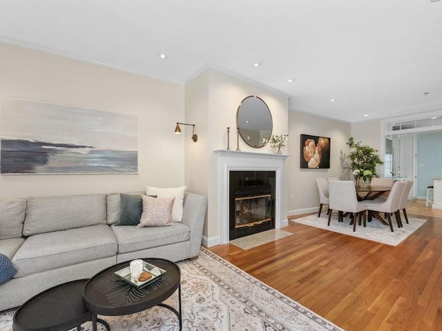 92 Warren St Unit W-1, Boston, MA 02129 - living room with ornamental molding, wood finished floors, a fireplace, baseboards, and recessed lighting