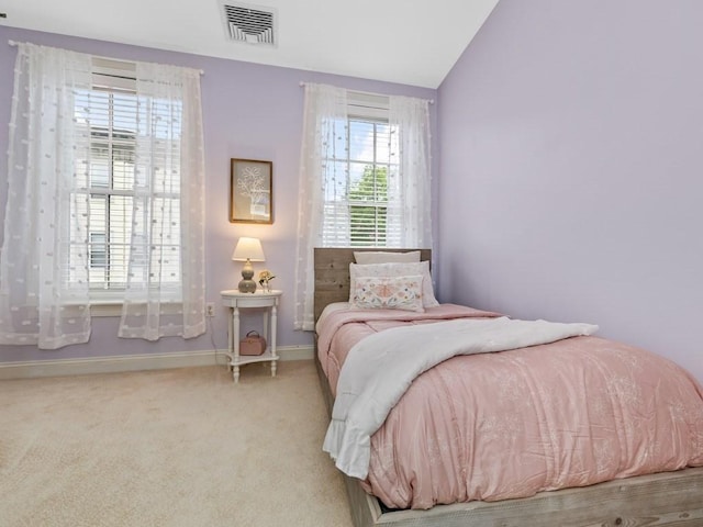 92 Warren St Unit W-1, Boston, MA 02129 - carpeted bedroom with vaulted ceiling and baseboards