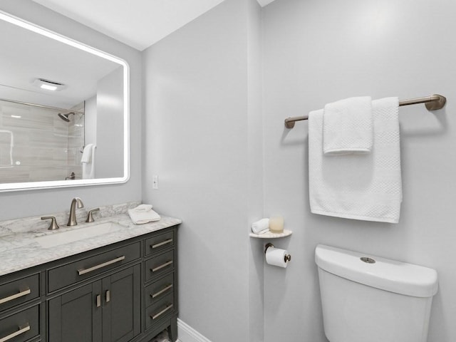 92 Warren St Unit W-1, Boston, MA 02129 - full bathroom with vanity, toilet, a shower, and baseboards