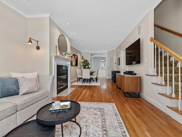 92 Warren St Unit W-1, Boston, MA 02129 - living area with wood finished floors, stairs, baseboards, crown molding, and recessed lighting