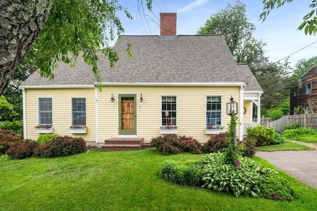 2 Dewey St, Amesbury, MA 01913 - cape cod home featuring a chimney and a shingled roof