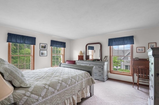 2 Dewey St, Amesbury, MA 01913 - bedroom featuring multiple windows and light carpet