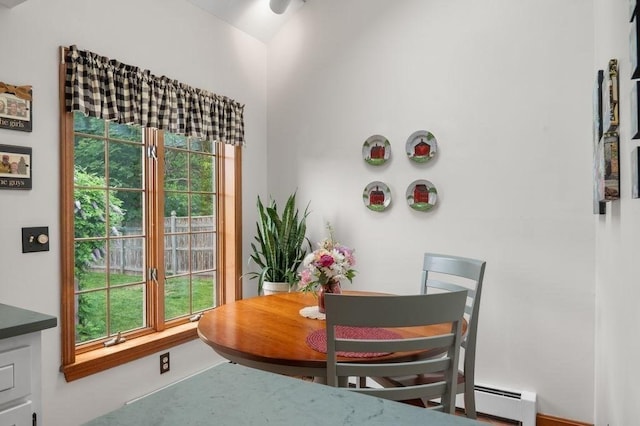 2 Dewey St, Amesbury, MA 01913 - dining area featuring a baseboard radiator