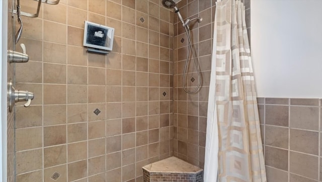 bathroom with a shower with curtain