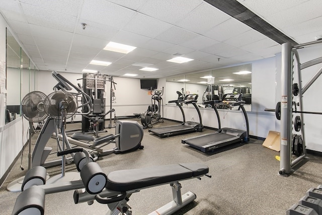 workout area with a drop ceiling