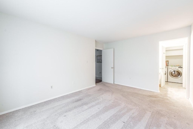 unfurnished bedroom with baseboards and light carpet