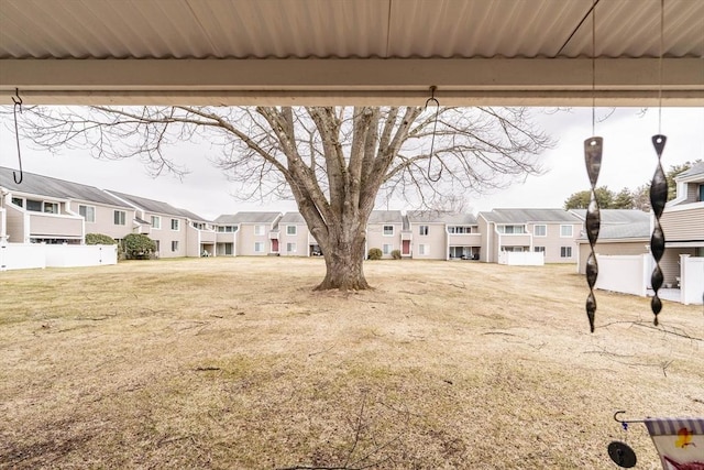 view of yard featuring a residential view