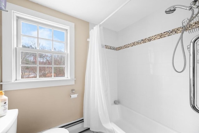 full bathroom featuring shower / bath combo with shower curtain and toilet