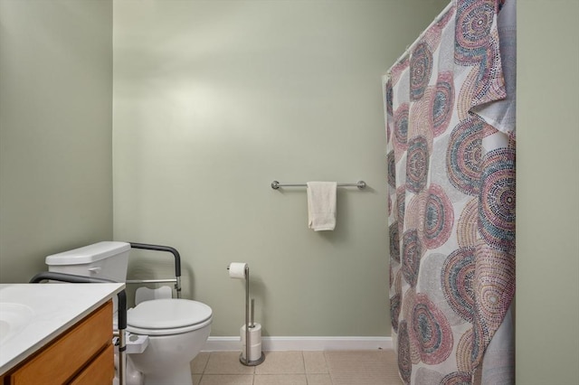 bathroom with a shower with curtain, tile patterned floors, vanity, and toilet