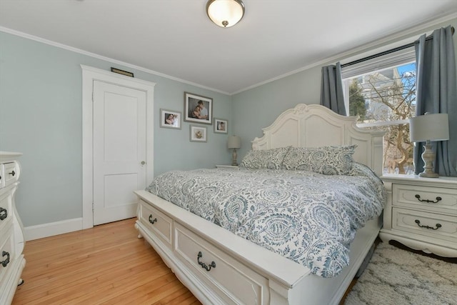 28 Fletcher St Unit 1, Boston, MA 02131 - bedroom featuring light wood finished floors, ornamental molding, and baseboards