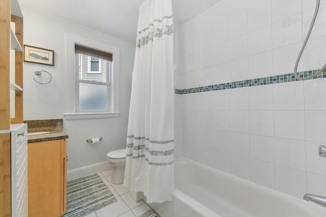 28 Fletcher St Unit 1, Boston, MA 02131 - bathroom with vanity, toilet, shower / tub combo with curtain, tile patterned flooring, and baseboards
