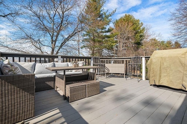 deck with an outdoor hangout area